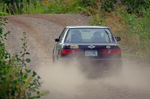 Jerry Rengo / Greg Hanka Nissan Sentra SE-R at a sharp left on SS3, Steamboat I.