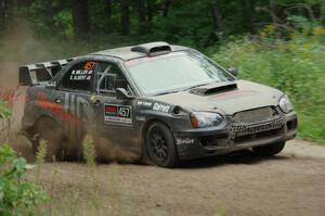 Sam Albert / Michelle Miller Subaru WRX STi at a sharp left on SS6, Steamboat II.