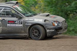 Sam Albert / Michelle Miller Subaru WRX STi at a sharp left on SS6, Steamboat II.