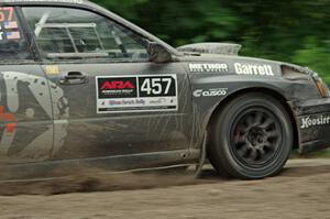 Sam Albert / Michelle Miller Subaru WRX STi at a sharp left on SS6, Steamboat II.