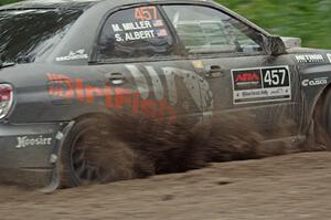 Sam Albert / Michelle Miller Subaru WRX STi at a sharp left on SS6, Steamboat II.