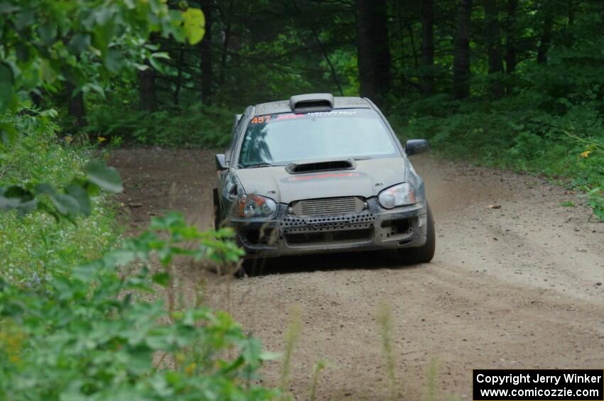 Sam Albert / Michelle Miller Subaru WRX STi at a sharp left on SS6, Steamboat II.