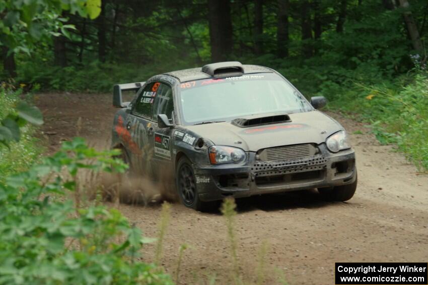 Sam Albert / Michelle Miller Subaru WRX STi at a sharp left on SS6, Steamboat II.