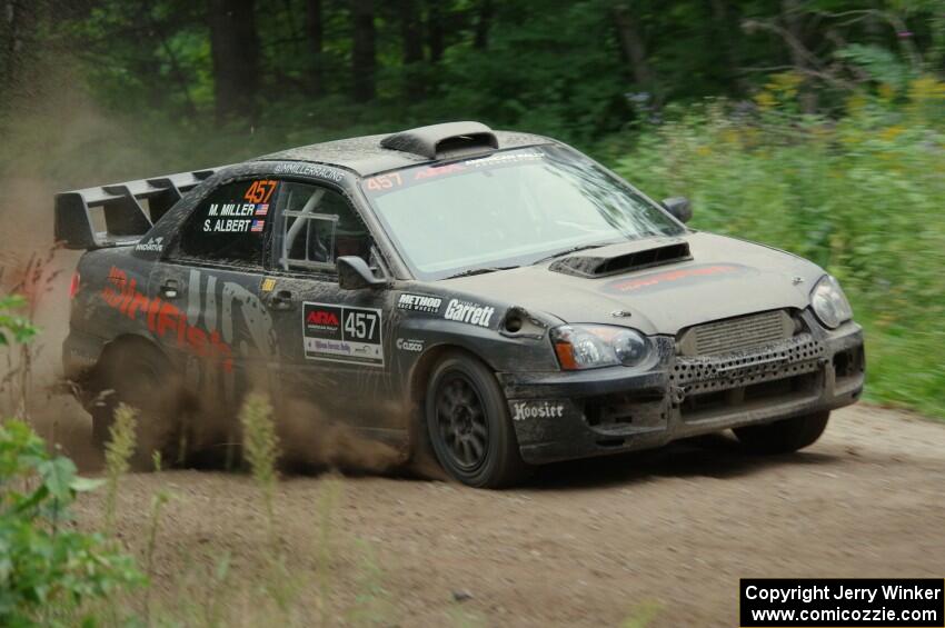 Sam Albert / Michelle Miller Subaru WRX STi at a sharp left on SS6, Steamboat II.