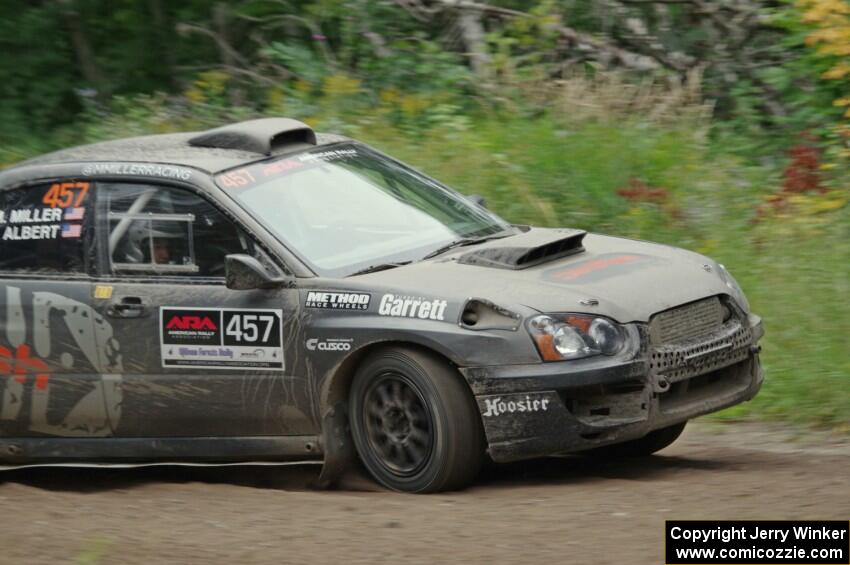 Sam Albert / Michelle Miller Subaru WRX STi at a sharp left on SS6, Steamboat II.