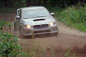 Travis Nease / Krista Skucas Subaru WRX STi at a sharp left on SS6, Steamboat II.