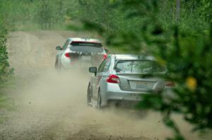 Travis Nease / Krista Skucas Subaru WRX STi chases Dennis Romero / Jose Maria Rodriguez Subaru WRX STi on SS6, Steamboat II.