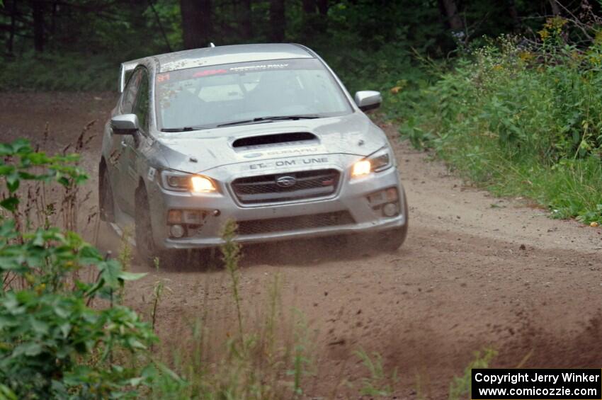 Travis Nease / Krista Skucas Subaru WRX STi at a sharp left on SS6, Steamboat II.