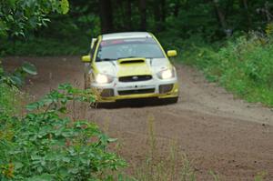 Mark Williams / Ben Peterson Subaru WRX STi at a sharp left on SS6, Steamboat II.