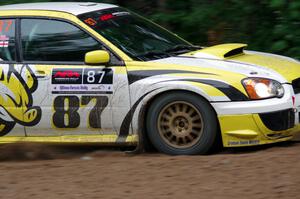 Mark Williams / Ben Peterson Subaru WRX STi at a sharp left on SS6, Steamboat II.