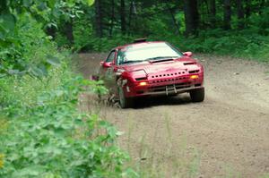 Al Dantes, Jr. / Brandon Snyder Mazda RX-7 Turbo at a sharp left on SS6, Steamboat II.