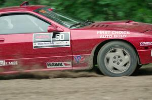 Al Dantes, Jr. / Brandon Snyder Mazda RX-7 Turbo at a sharp left on SS6, Steamboat II.