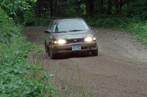 Jerry Rengo / Greg Hanka Nissan Sentra SE-R at a sharp left on SS6, Steamboat II.