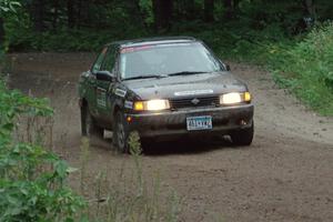 Jerry Rengo / Greg Hanka Nissan Sentra SE-R at a sharp left on SS6, Steamboat II.