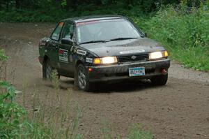 Jerry Rengo / Greg Hanka Nissan Sentra SE-R at a sharp left on SS6, Steamboat II.