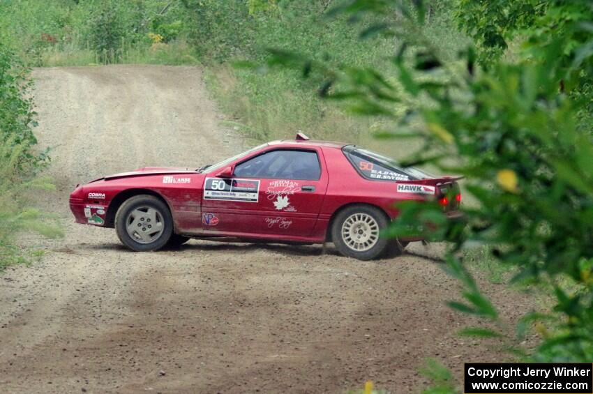 Al Dantes, Jr. / Brandon Snyder Mazda RX-7 Turbo slide to a stop on SS6, Steamboat II.