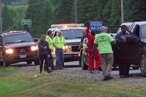 Sumit Panjabi / Nitan Jacob Mitsubishi Lancer Evo X gets readied to be towed back to Walker after rolling.