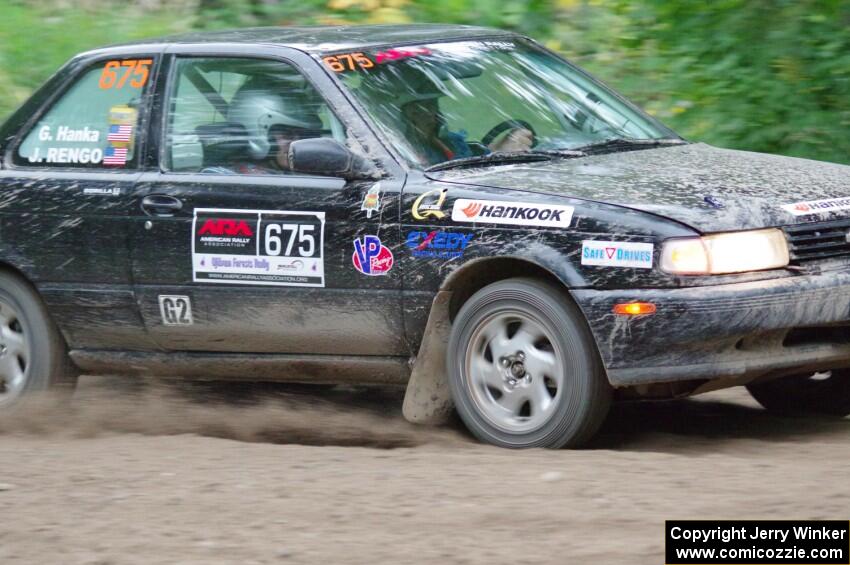 Jerry Rengo / Greg Hanka Nissan Sentra SE-R at a sharp left on SS6, Steamboat II.