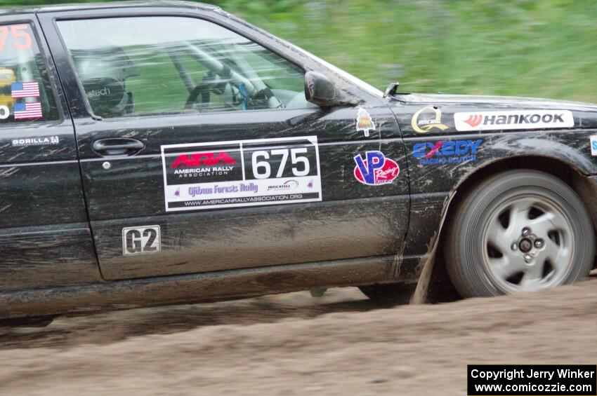 Jerry Rengo / Greg Hanka Nissan Sentra SE-R at a sharp left on SS6, Steamboat II.