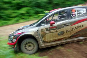 Travis Pastrana / Robbie Durant Subaru WRX STi comes through the VIP spectator corner on SS8, Perkins Road.