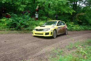 Lauchlin O'Sullivan / Scott Putnam Subaru WRX STi comes through the VIP spectator corner on SS8, Perkins Road.