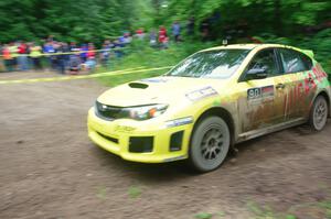 Lauchlin O'Sullivan / Scott Putnam Subaru WRX STi comes through the VIP spectator corner on SS8, Perkins Road.