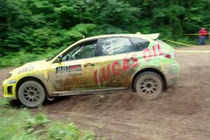 Lauchlin O'Sullivan / Scott Putnam Subaru WRX STi comes through the VIP spectator corner on SS8, Perkins Road.