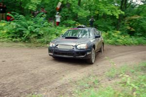 Sam Albert / Michelle Miller Subaru WRX STi comes through the VIP spectator corner on SS8, Perkins Road.