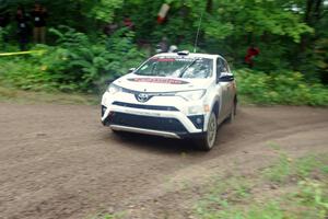 Ryan Millen / Rhianon Gelsomino Toyota RAV4 SE comes through the VIP spectator corner on SS8, Perkins Road.