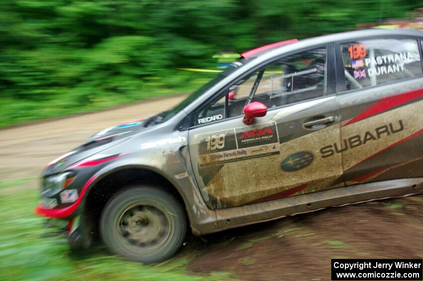 Travis Pastrana / Robbie Durant Subaru WRX STi comes through the VIP spectator corner on SS8, Perkins Road.