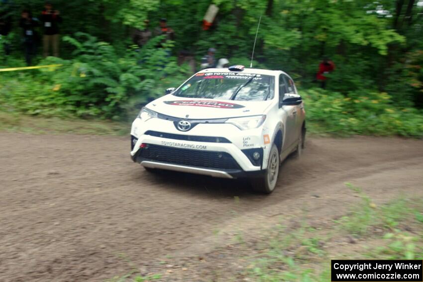 Ryan Millen / Rhianon Gelsomino Toyota RAV4 SE comes through the VIP spectator corner on SS8, Perkins Road.