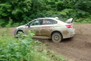 Travis Nease / Krista Skucas Subaru WRX STi comes through the VIP spectator corner on SS8, Perkins Road.