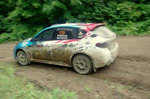 Dennis Romero / Jose Maria Rodriguez Subaru WRX STi comes through the VIP spectator corner on SS8, Perkins Road.