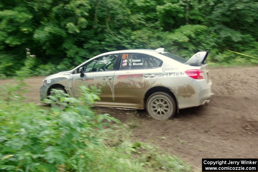 Travis Nease / Krista Skucas Subaru WRX STi comes through the VIP spectator corner on SS8, Perkins Road.