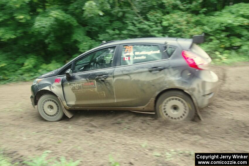 Dave Wallingford / Leanne Junnila Ford Fiesta comes through the VIP spectator corner on SS8, Perkins Road.