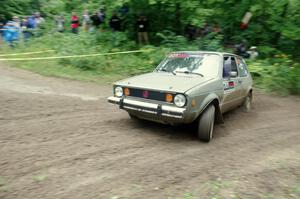 Adam VanDamme / Jake Carlson VW Rabbit comes through the VIP spectator corner on SS8, Perkins Road.