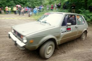 Adam VanDamme / Jake Carlson VW Rabbit comes through the VIP spectator corner on SS8, Perkins Road.