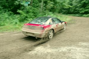 Tret West / Brandon Reinhardt Eagle Talon comes through the VIP spectator corner on SS8, Perkins Road.