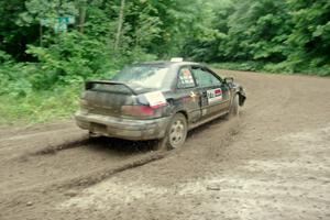 Kristian Rue / Mark Rue Subaru Impreza 2.5RS comes through the VIP spectator corner on SS8, Perkins Road.