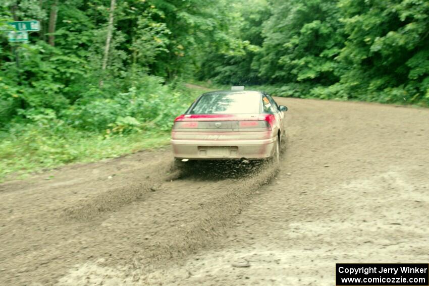 Tret West / Brandon Reinhardt Eagle Talon comes through the VIP spectator corner on SS8, Perkins Road.