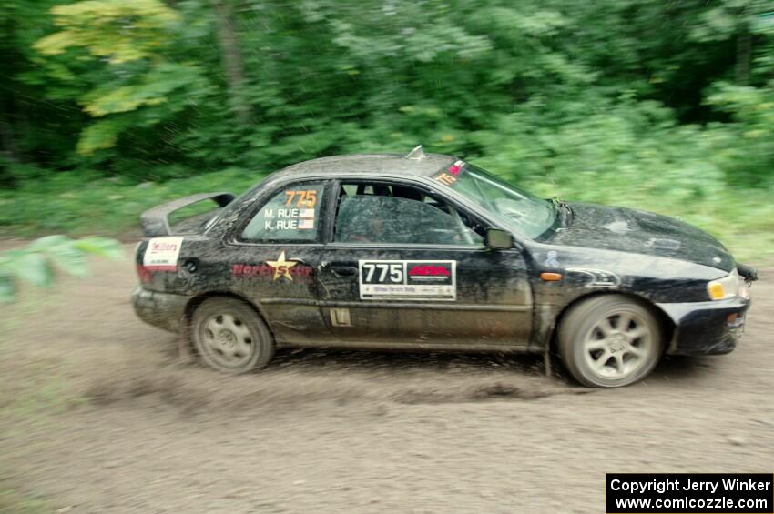 Kristian Rue / Mark Rue Subaru Impreza 2.5RS comes through the VIP spectator corner on SS8, Perkins Road.