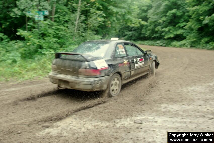 Kristian Rue / Mark Rue Subaru Impreza 2.5RS comes through the VIP spectator corner on SS8, Perkins Road.