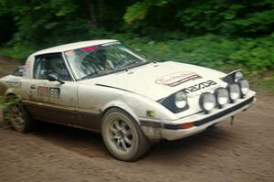 Mike Halley / Jimmy Brandt Mazda RX7 GSL-SE comes through the VIP spectator corner on SS8, Perkins Road.