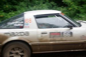 Mike Halley / Jimmy Brandt Mazda RX7 GSL-SE comes through the VIP spectator corner on SS8, Perkins Road.