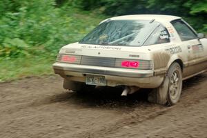 Mike Halley / Jimmy Brandt Mazda RX7 GSL-SE comes through the VIP spectator corner on SS8, Perkins Road.