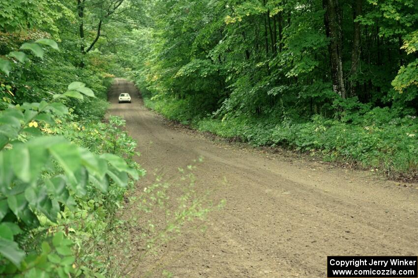 Mike Halley / Jimmy Brandt Mazda RX7 GSL-SE comes into the VIP spectator corner on SS8, Perkins Road.