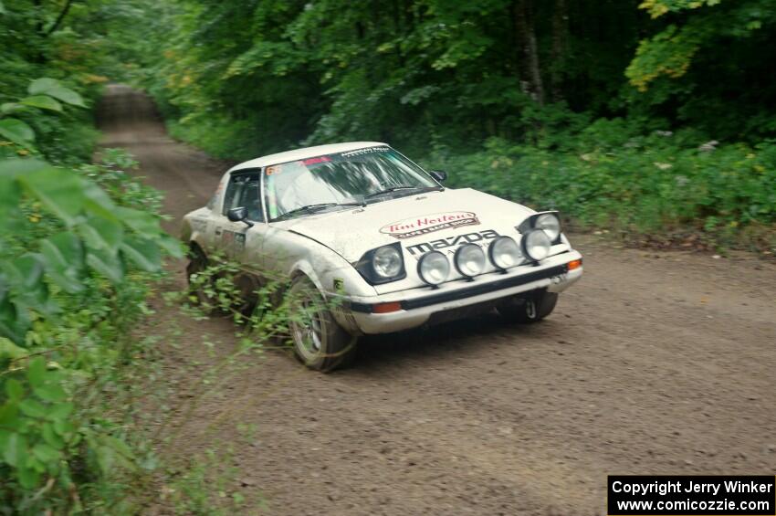Mike Halley / Jimmy Brandt Mazda RX7 GSL-SE comes into the VIP spectator corner on SS8, Perkins Road.