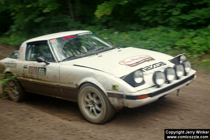 Mike Halley / Jimmy Brandt Mazda RX7 GSL-SE comes through the VIP spectator corner on SS8, Perkins Road.