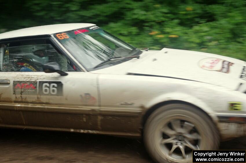 Mike Halley / Jimmy Brandt Mazda RX7 GSL-SE comes through the VIP spectator corner on SS8, Perkins Road.