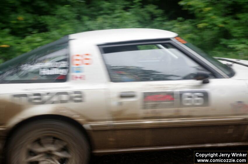 Mike Halley / Jimmy Brandt Mazda RX7 GSL-SE comes through the VIP spectator corner on SS8, Perkins Road.